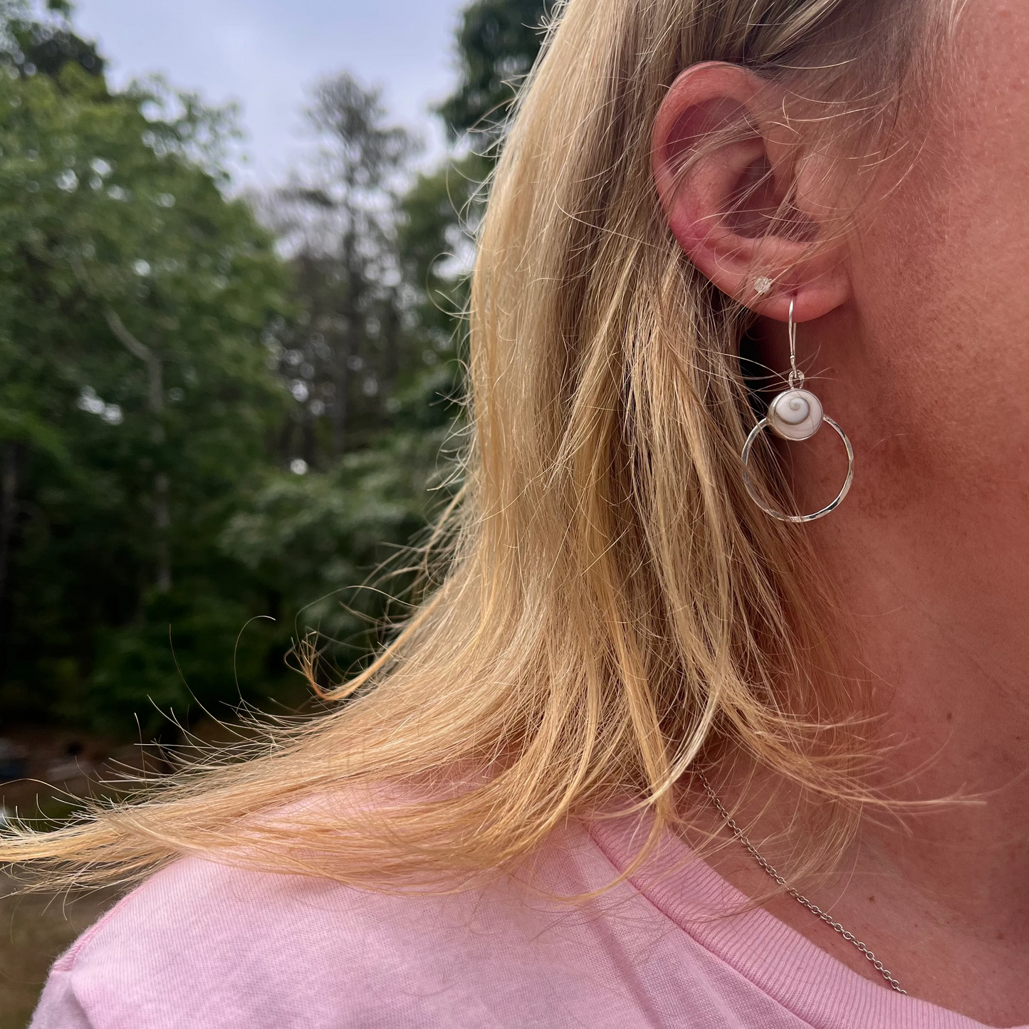 Sterling Silver hoop earrings with shiva shells and a hammered finish