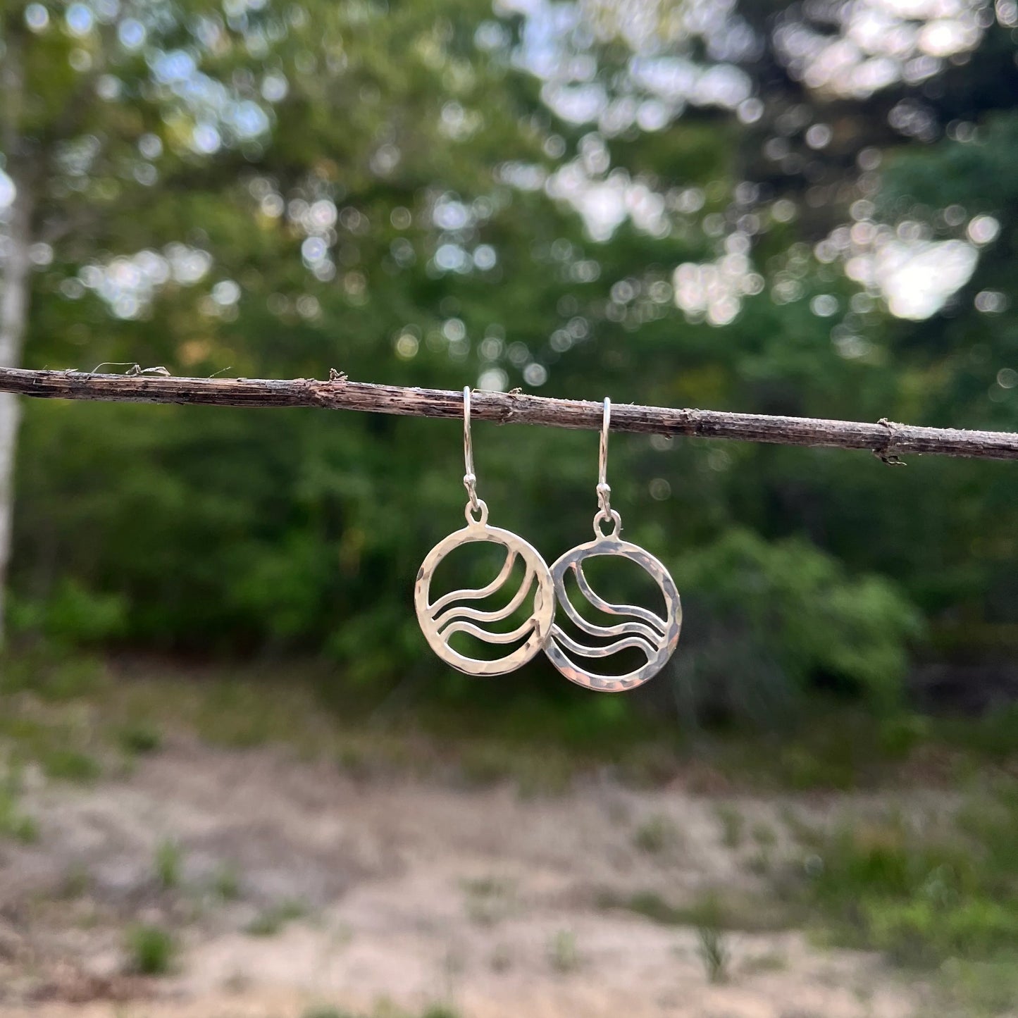 Hammered sterling silver circular earrings with ripples