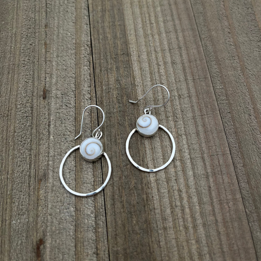 Sterling Silver hoop earrings with shiva shells and a hammered finish