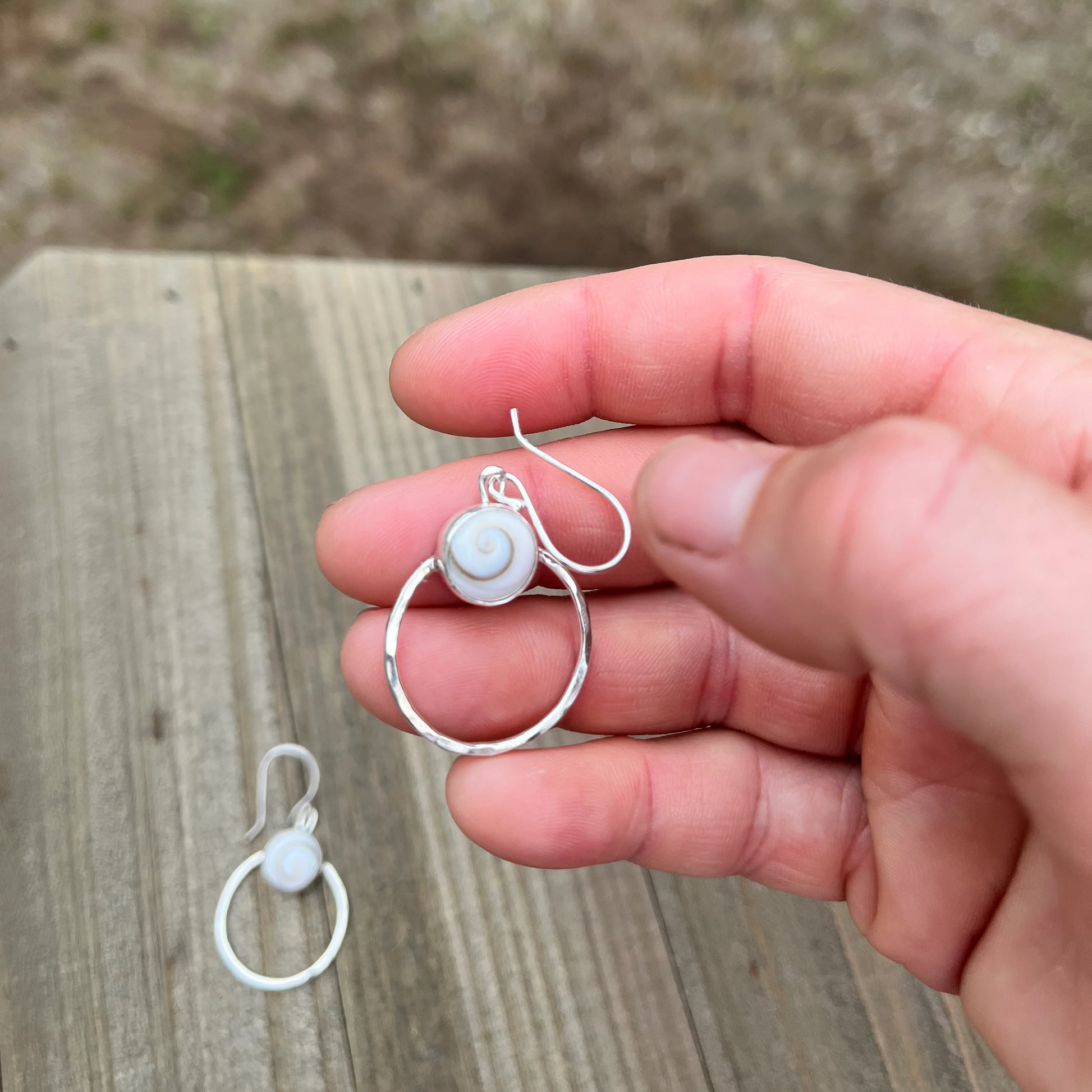 Sterling Silver hoop earrings with shiva shells and a hammered finish